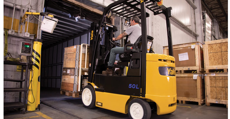 Forlift entering a container